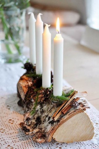 centro-tavola natalizio tronco con candele